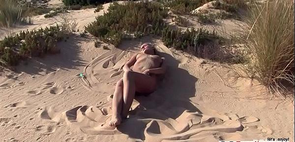  Zuzana Z. Hot blonde doing sand angels